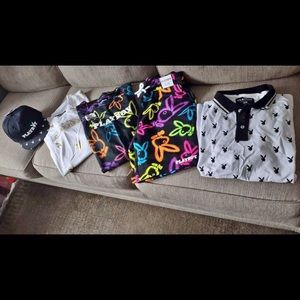 Three shirts one pair of shorts and a flat beak hat